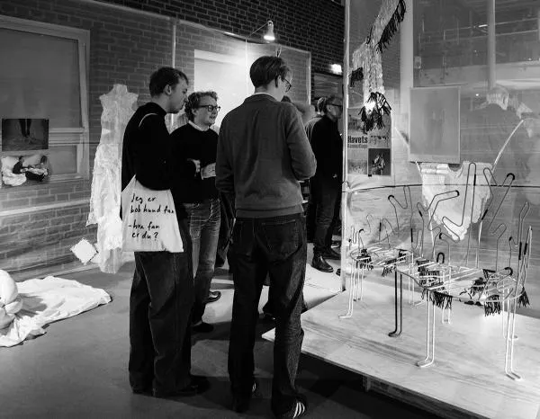 People in Exhibition Hall. Photo. 