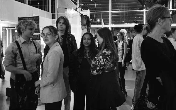 People in Exhibition Hall. Photo. 