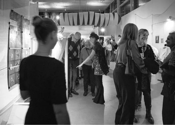 People in Exhibition Hall. Photo. 