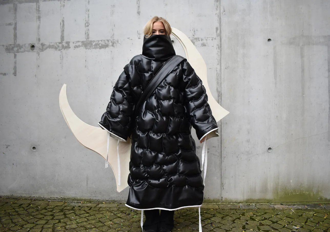 Woman in coat. Photo.