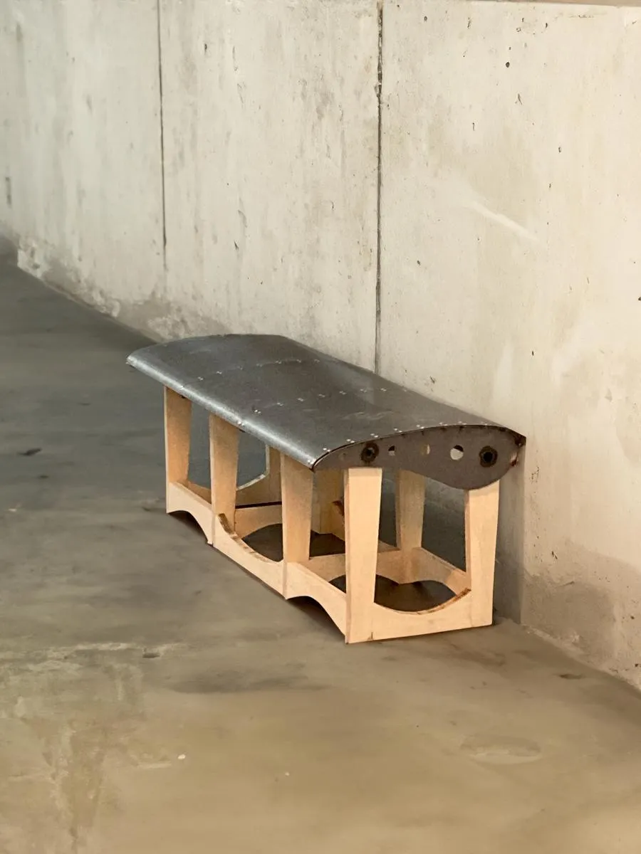 Metal and wooden stool. Photo.