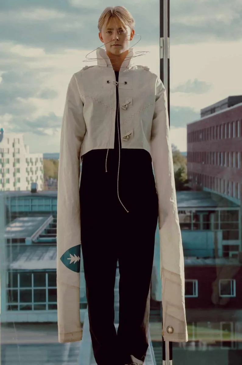White cotton shirt with long arms. Photo. 