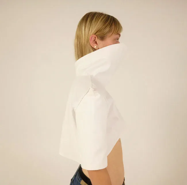 Woman wearing white shirt. Photo.