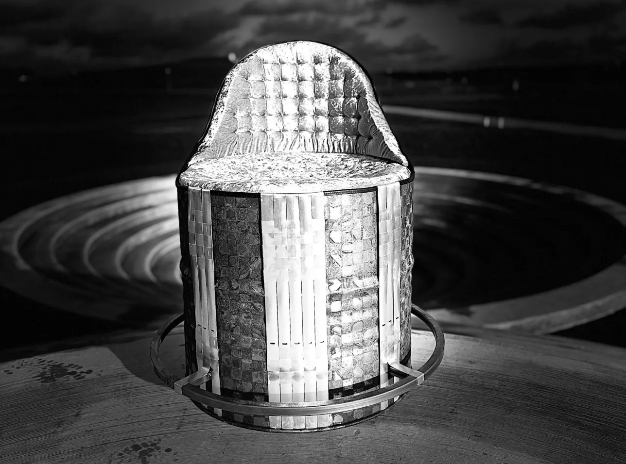 Shiny metal chair. Photo.