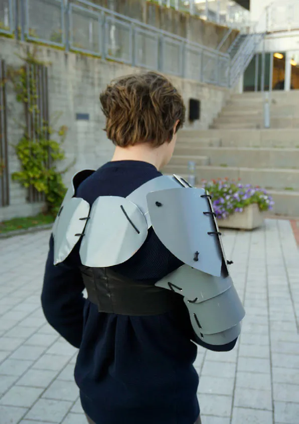 Man wearing a plastic armour. Photo.