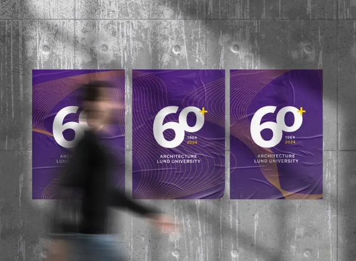 Three posters for the 60th anniversary are hanging on a wall. Graphics/photo.